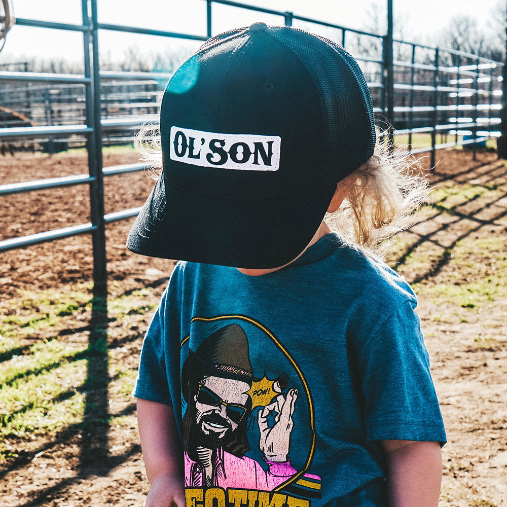 A child wearing the Ol’ Son Patch Meshback KIDS hat