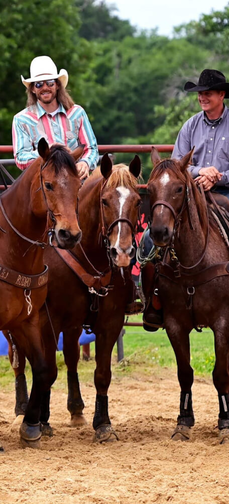 Dale Brisby and a group of cowboys on horses