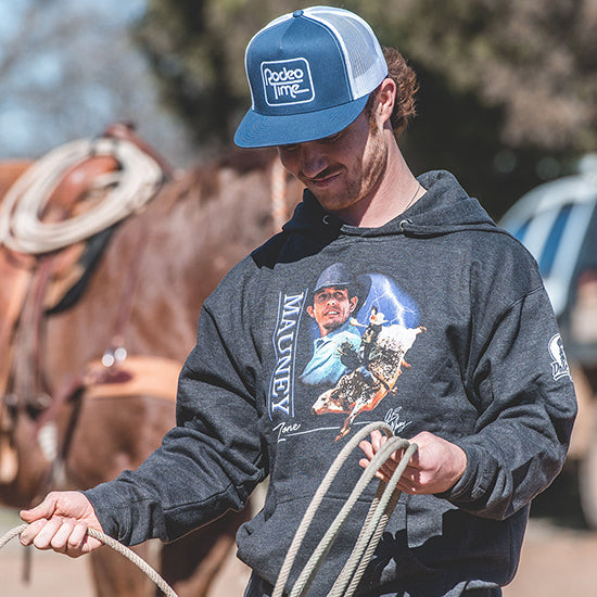 A man wearing the Mauney Zone hoodie